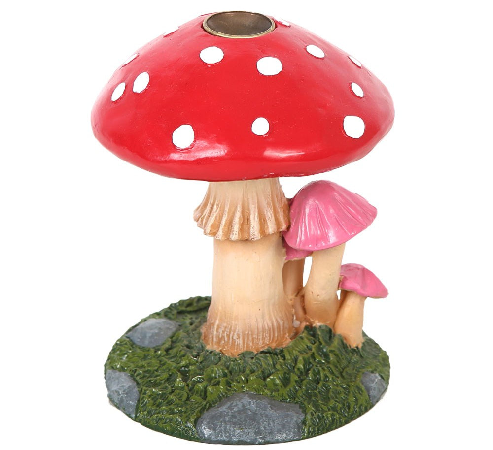 red and pink mushroom incense burner