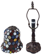 A Tiffany-style stained glass table lamp shade and matching metal lamp base shown on a plain white background.