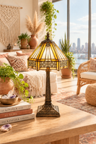 Art Deco Tiffany style table lamp on a wooden table.