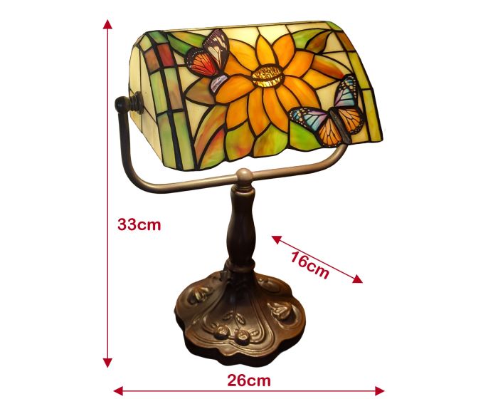 A Tiffany-style table lamp with a stained glass sunflower and butterfly shade, mounted on an ornate bronze-colored metal base. Red dimension arrows and labels indicate a height of 33cm, width of 26cm, and shade depth of 16cm on a plain white background.