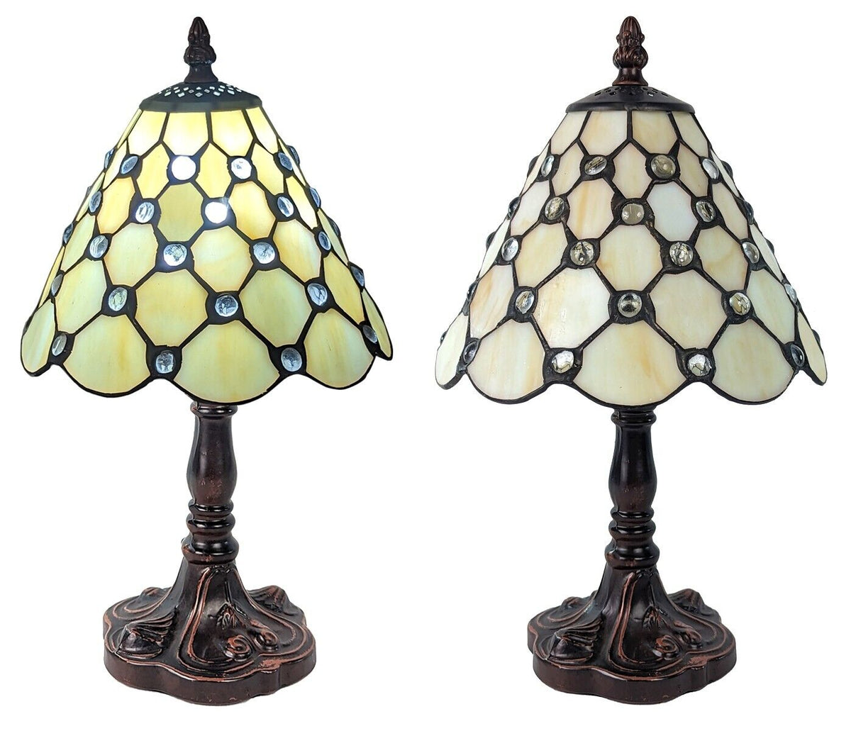 Two stained glass table lamps with intricate designs on a white background.