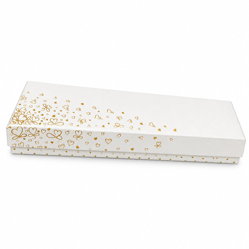 A white rectangular gift box with gold foil heart and bow patterns on the lid, shown on a clean white background.