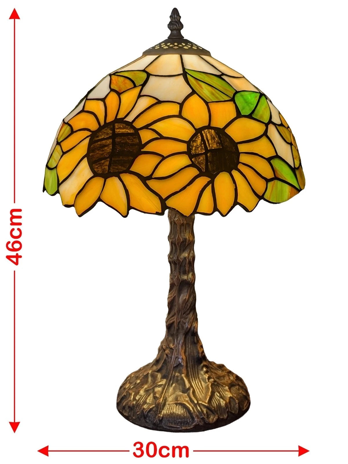 Tiffany-style stained glass table lamp with a sunflower design, featuring a textured tree trunk base and red dimension markers showing 46cm height and 30cm width on a white background.