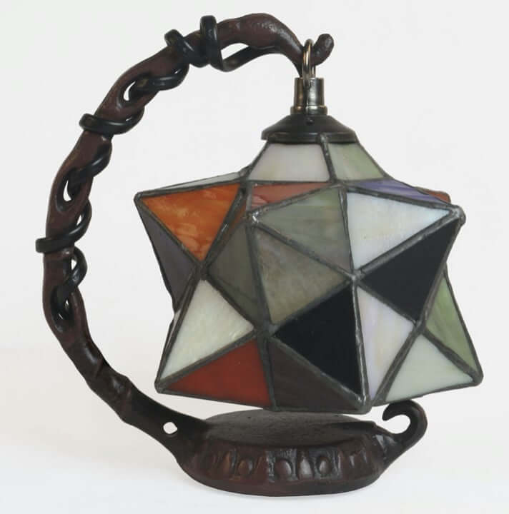 Multi-coloured 3D star-shaped Tiffany stained glass table lamp with a dark metal base